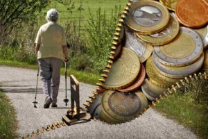 pensionata, monete e chiusura lampo